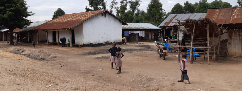 Fietsstop in een Oegandees dorp